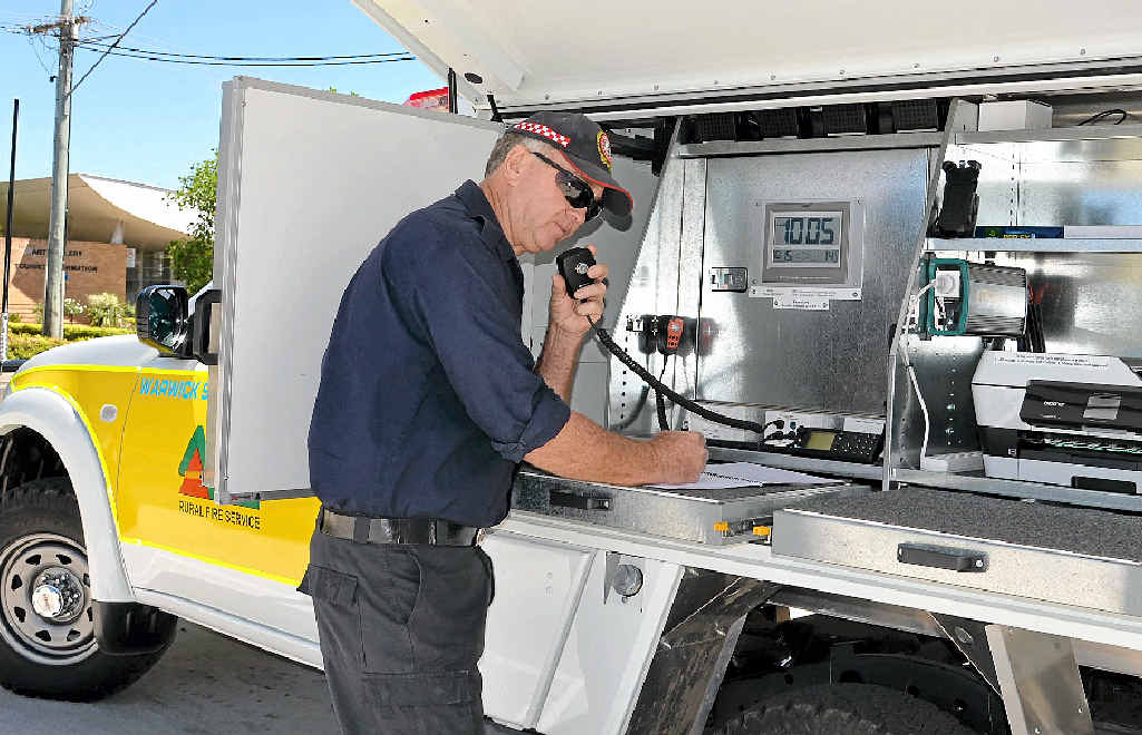 Mr Stacey shows off the new Warwick 91 command vehicle, fully funded by Council's fire levy.